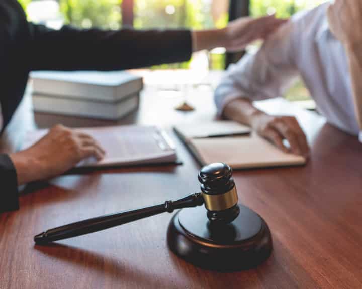 professional lawyer discussing legal options and solutions with a client in Fort Worth